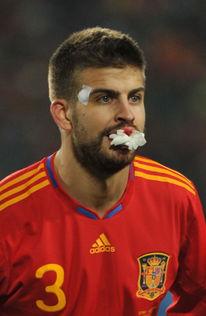 皮克的照片,捕捉足球巨星赛场英姿